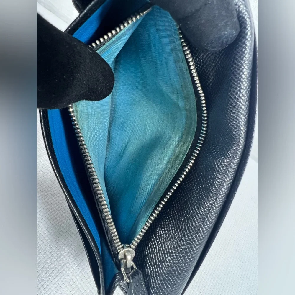 1050: Bvlgari Logo Ring Continental Wallet Black Grained Leather Blue